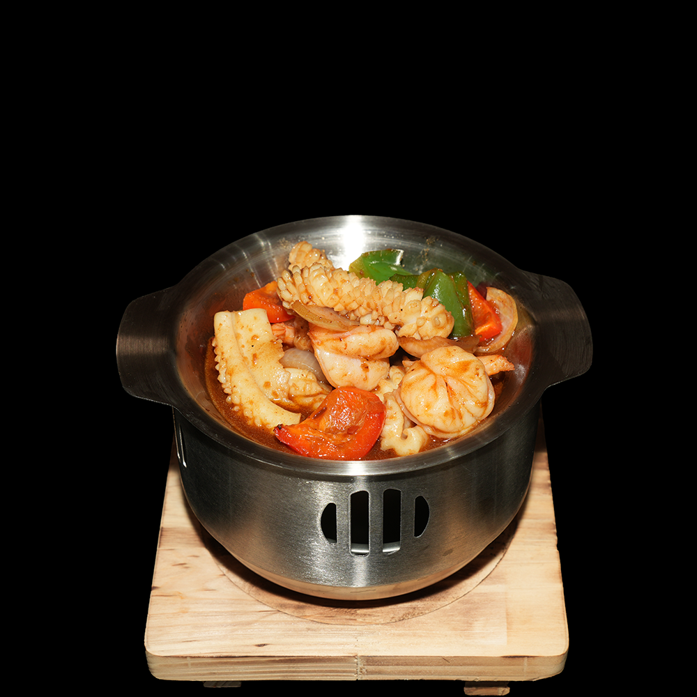 Mini wok de marisco salsa picante